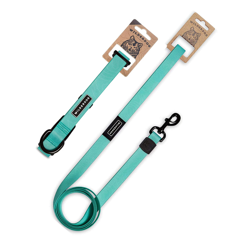 The Seafoam Waterproof Leash + Collar Bundle (x), featuring stink-proof turquoise gear with black clips and “Wilddog” branding, is shown on a white background with attached cardboard tags.